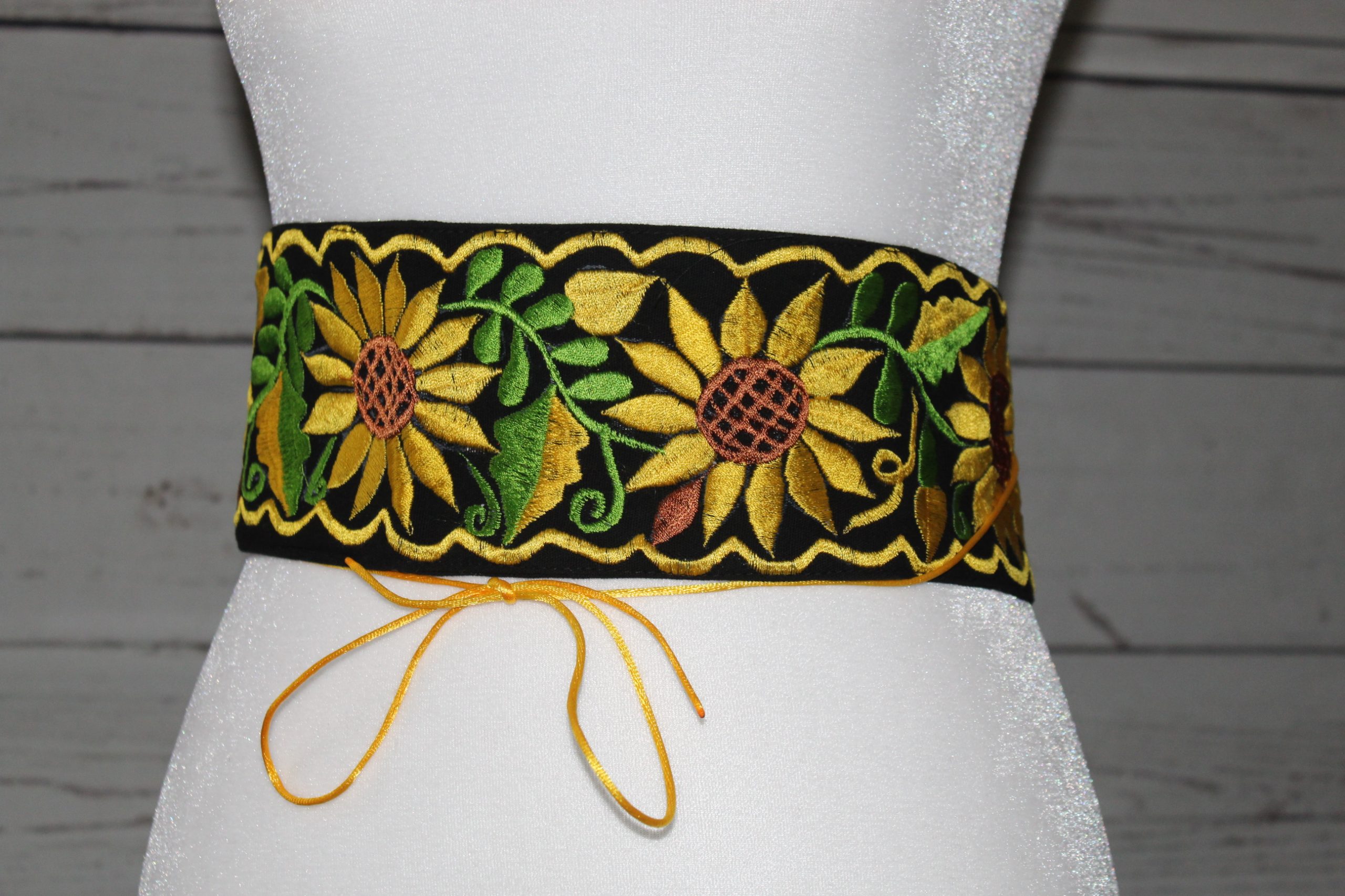 Black embordered belt with yellow sunflowers and yellow border